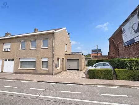 maison prête à emménager avec garage et jardin