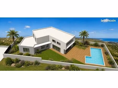 terrain + villa d'architecte proche plage
