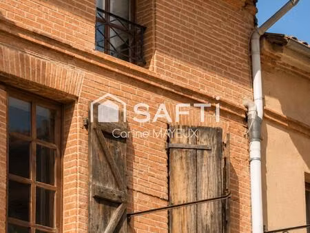 immeuble commercial avec logement – centre-bourg de fronton