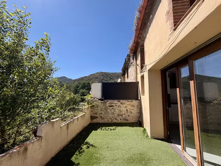 rodes - maison de village avec garage et terrasse