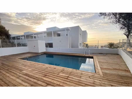 t2 neuf avec piscine  tennis  sur les hauteurs de nice  vue mer imprenable