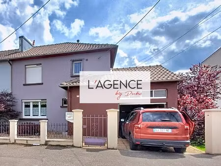 maison 3 chambres avec garage  sous-sol et terrain de 385 m²