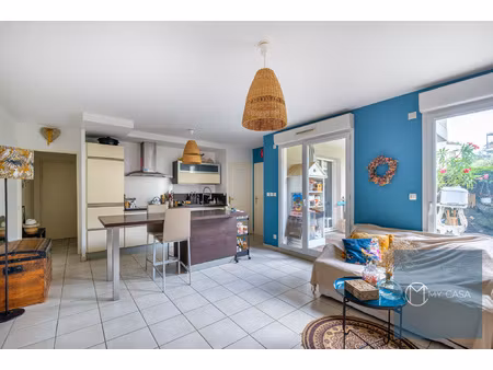 tassin - superbe t3 de 58 m2 en rez-de-jardin