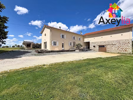 a vendre - panissieres - ancien corps de ferme renove avec dependances et vue degagee