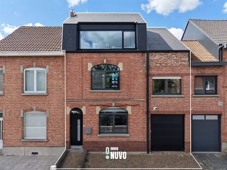 instapklare woning met tuin en garage in centrum van herent