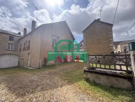 58  à tannay centre bourg tous commerces à pied - propriété de deux maisons habitables.