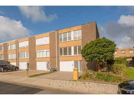 maison 3 façades avec 4 chambres  garage et jardin à hombeek