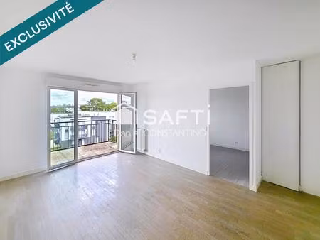 appartement f2  47m² avec balcon et parking s.sol