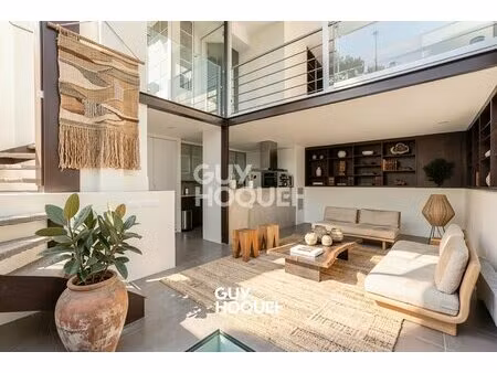 a vendre - superbe loft d'exception sur le canal saint martin