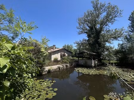 belle maison avec 2 granges  mare et terrain de 6105m2 au ca