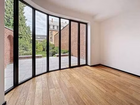 appartement 2 chambres + jardin + garage en rez-de-chaussée