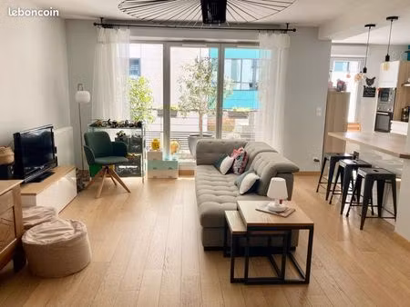 appartement traversant t4 avec balcon et garage