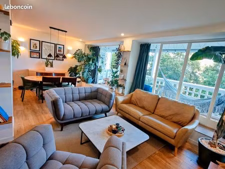 t3 de 75 m² rénové  balcon  garage  vue sur lyon