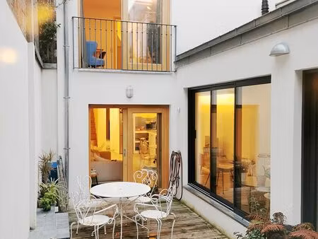 appartement en duplex de 90m2  dans un petit immeuble d’architecte récent  avec terrasse e