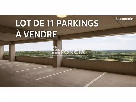 evry-courcouronnes - lot de 11 places de parkings intérieurs en silo