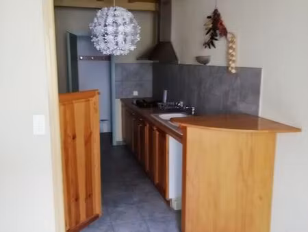 appartement t4 de 100 m² avec garage – investissement locatif – centre-ville de mirande