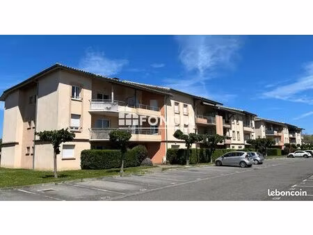 appartement de type 3 avec balcon et parking privatif