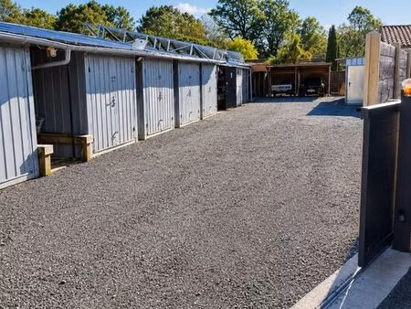 ◊ investissement clé en main – 26 boxes loués à 100 % + maison neuve 2024 – 33 500 /an de 