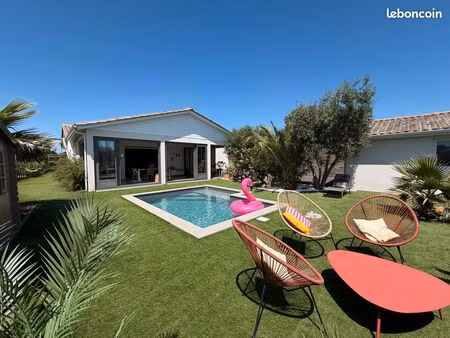 élégante maison familiale de 133 m² avec piscine  double garage et prestations de qualité