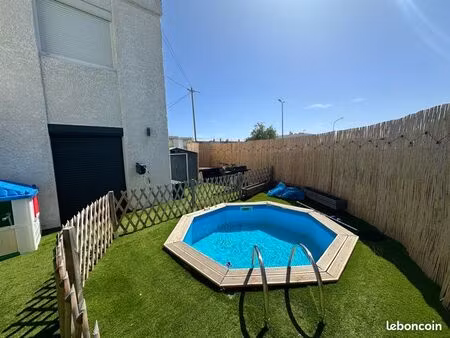 appartement rdc dans maison divisée en 2 lots