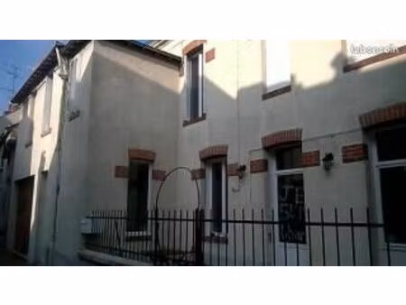 maison centre ville dans quartier calme