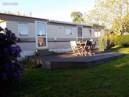 vend terrain + son mobile-home