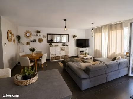 appartement 3 pièces de 68 m2 avec jardin privatif de 96 m²  garage et parking