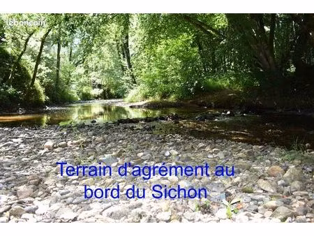 beau terrain d'agrément au bord de sichon