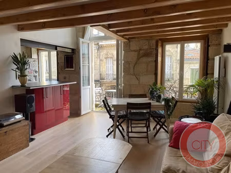 immeuble en pierre appart en duplex + cave