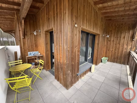 appartement de 3 pieces avec terrasse et 2 places de parking