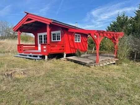chalet en bois avec vue sur la campagne et les pyrénées