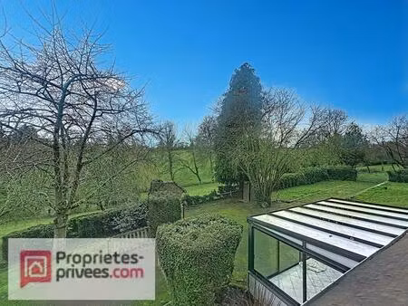 grande maison familiale aux portes de lisieux  dans un environnement boisé