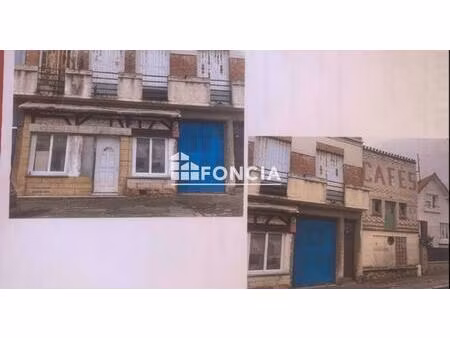 ensemble immobilier a rénover totalement mais avec un réel potentiel ! réservé a un profes