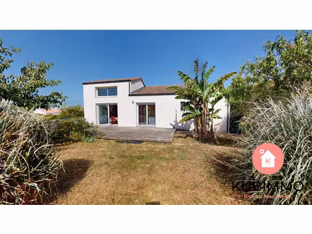 maison lumineuse avec 120 m² de garage/sous sol et jardin arbor