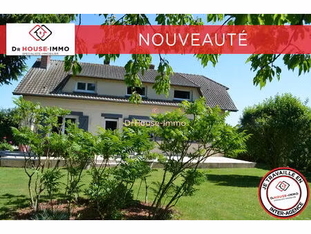 à vendre maison spacieuse et lumineuse sur un terrain arboré d'environ 3500 m² avec possib