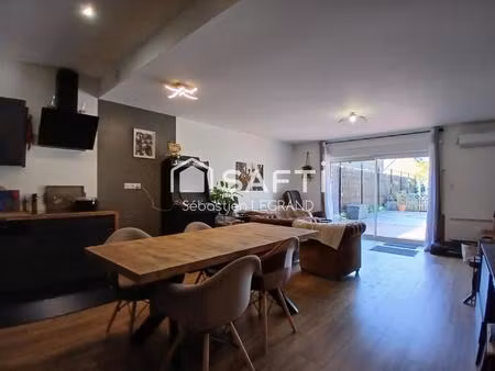 appartement 3 chambres avec jardin  cave et parkings