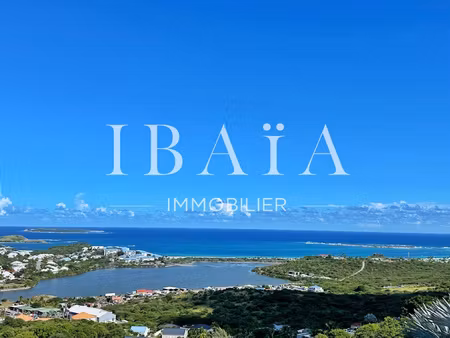 proche baie orientale - terrain vue mer exceptionnel de 3.00