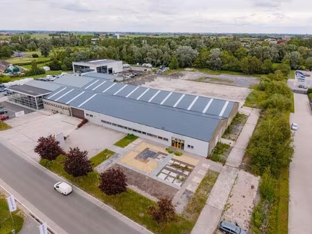 industriegrond van 14.768 m² met bedrijfsgebouw van 3.025 m² te koop