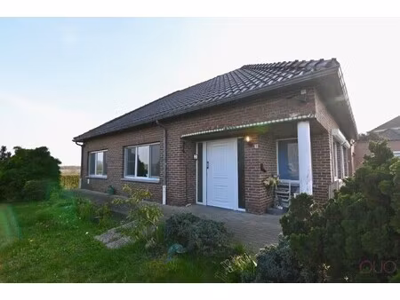 gelijkvloerse woning gelegen in het midden van de haspengouwse velden