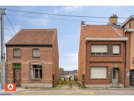te renoveren halfopen bebouwing met zuidwestgerichte tuin
