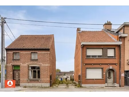 te renoveren halfopen bebouwing met zuidwestgerichte tuin