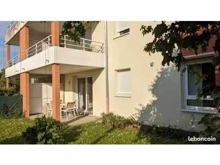 f2 en rez-de- jardin (54 m²) avec garage