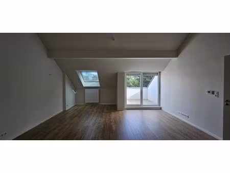 duplex en attique avec terrasse – résidence récente à huningue