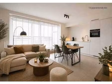 recent appartement met terras en carport