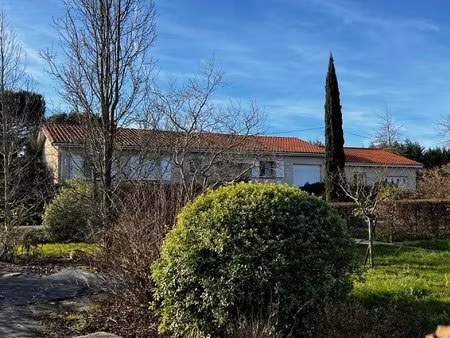 maison plain pied au coeur d'un parc