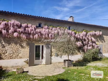 maison traditionnelle en pierre mitoyenne de 3 chambres avec