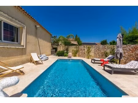 maison de plain-pied avec piscine  dépendance et terrasse à baillargues