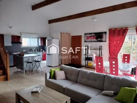 appartement de 121m² avec mezzanine terrasse et parking dans une maison divisée en 2 logme