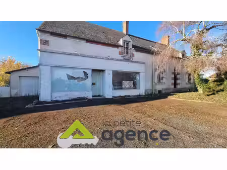 a vendre maison + local commercial + terrain constructible