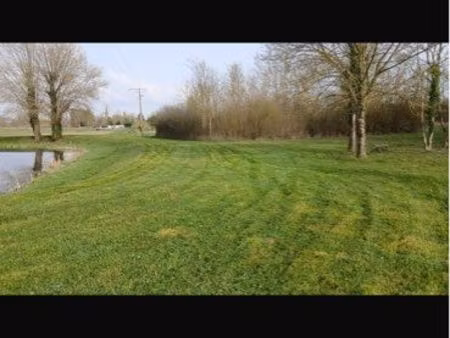location de terrain 7000 m avec grande pelouse  toilette  un étang pour la pêche de 500 m²